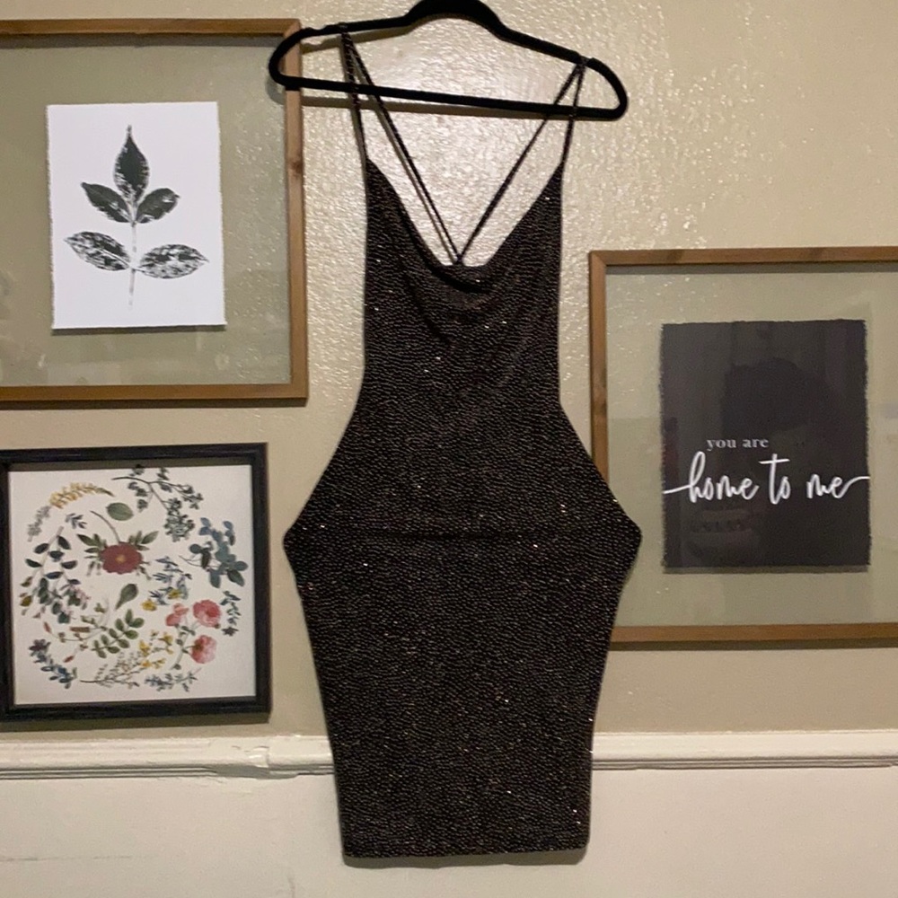 Black Shimmery dress! Loose at the chest area. X straps at the back.